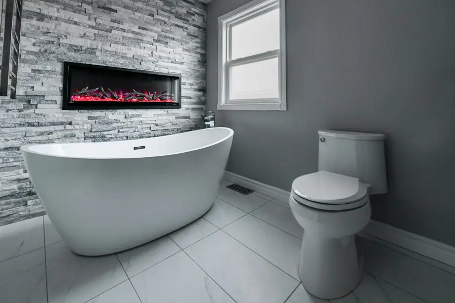 Illustrative photo of a modern bathroom with a freestanding bath. Not a McNab Plumbing renovation.